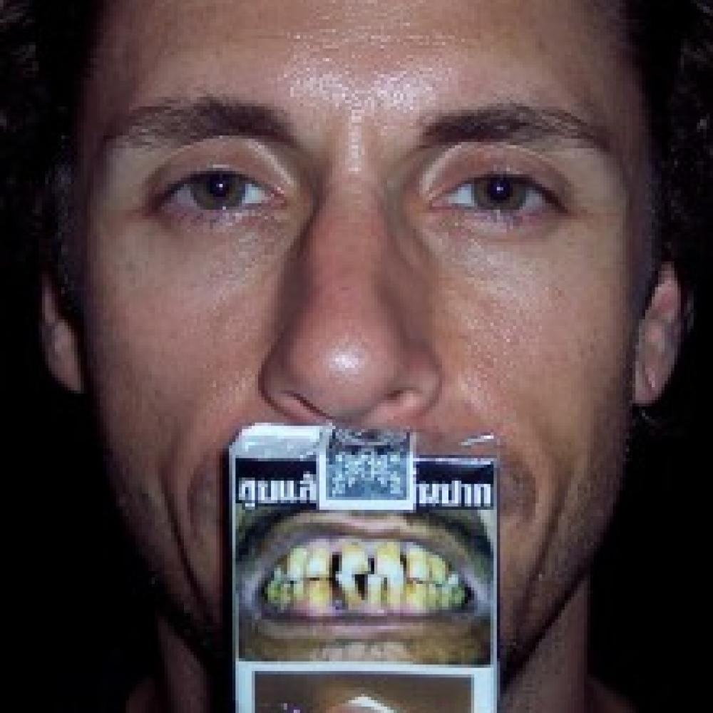 man with cigarette carton